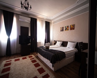 Две нощувки + дегустация на 5 вида вино за двама в Мелник с включени две вечери и закуски, релакс зона и вход за музея на виното + посещение на с. Долене